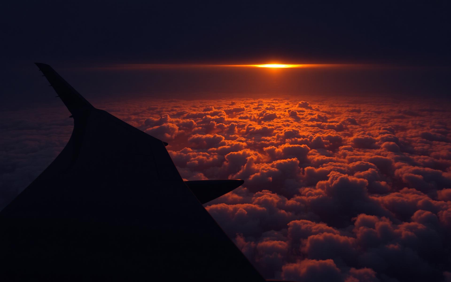 Aerial sunset above the clouds